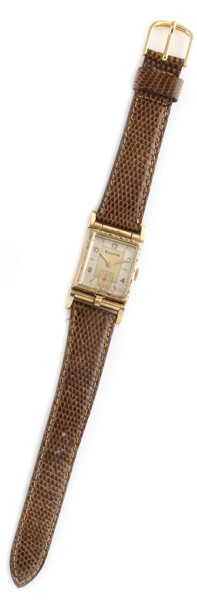 Null BULOVA 大约1940年。编号：3095854。10K镀金的腕表。长方形表壳，金色和白色两种色调的签名表盘，阿拉伯数字和指挥棒数字，金色指针。6点&hellip;