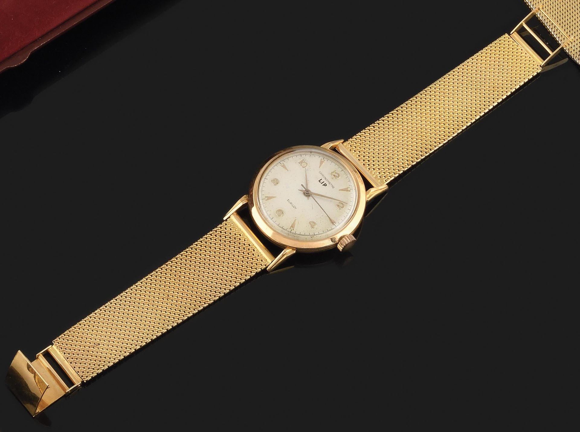 Null LIP R25 Chronometre Elgidoy 大约1960年。黄金750/1000腕表，圆形表壳，灰色表盘，签名。条形索引和阿拉伯数字以及黄&hellip;