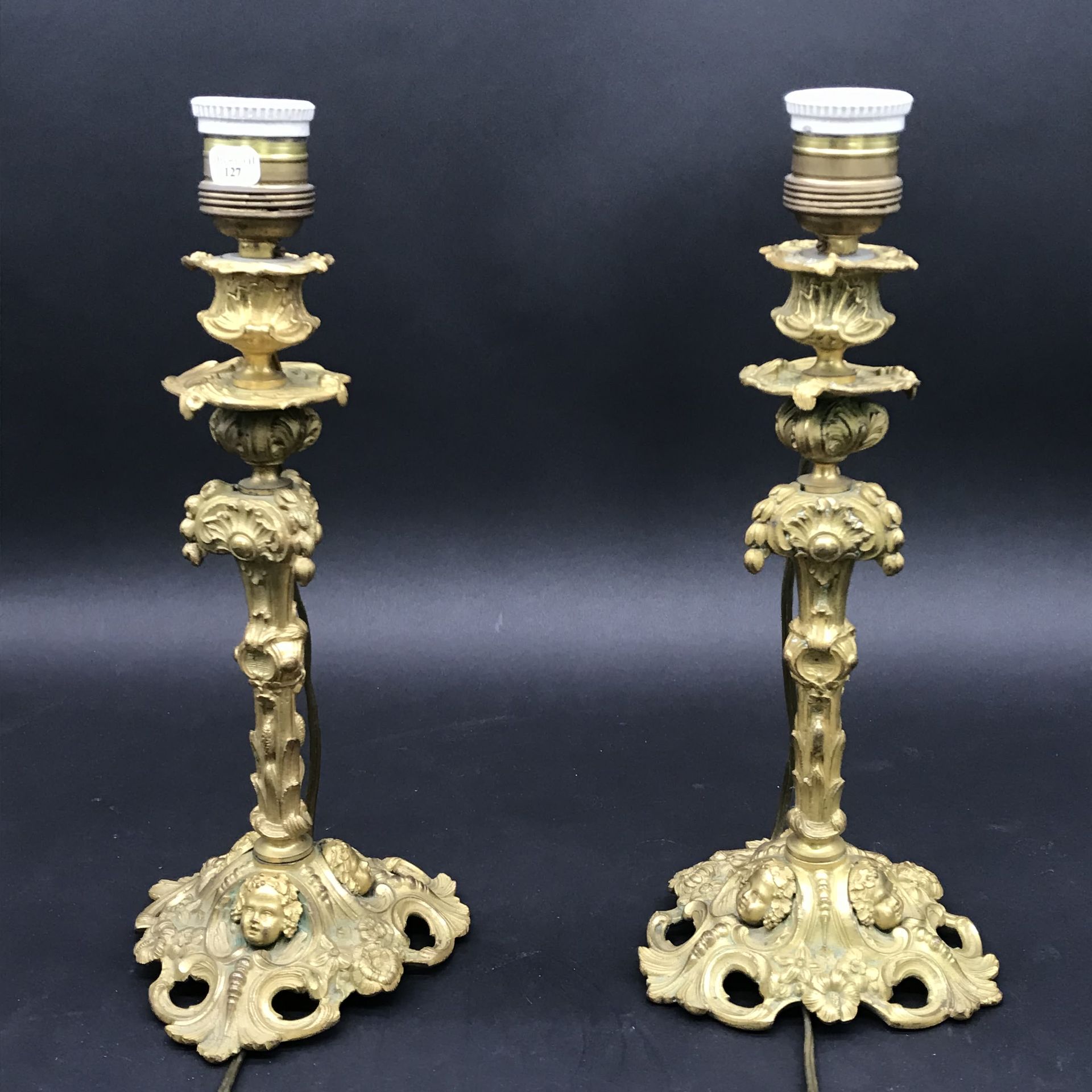 Null Pair of CANDLES

in gilded and chased bronze with foliage decoration and de&hellip;