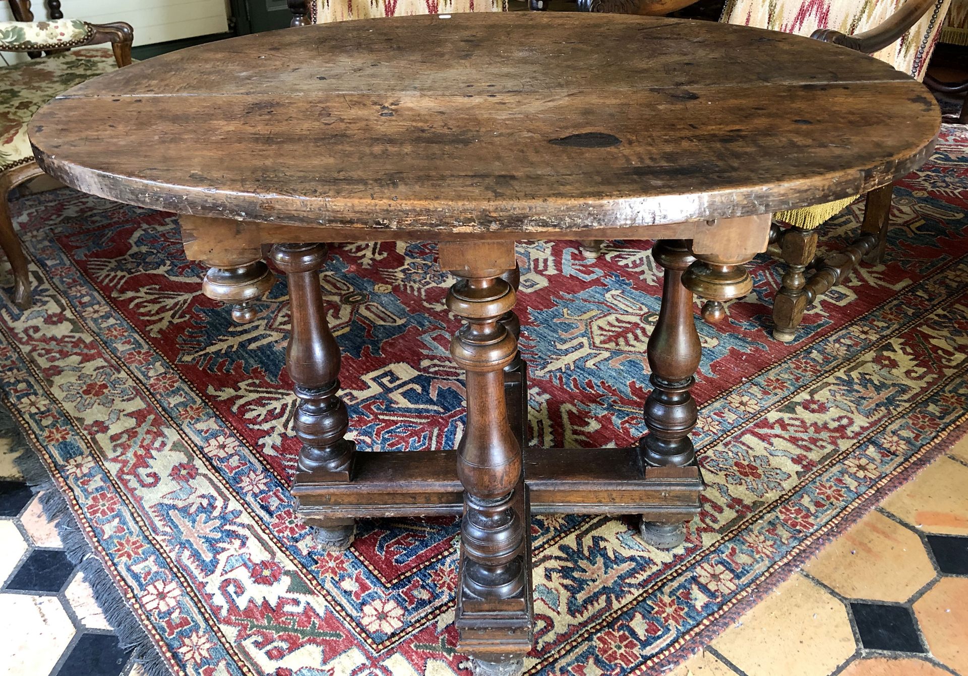 Null Oval middle table in walnut turned and moulded with a quadripod in baluster&hellip;