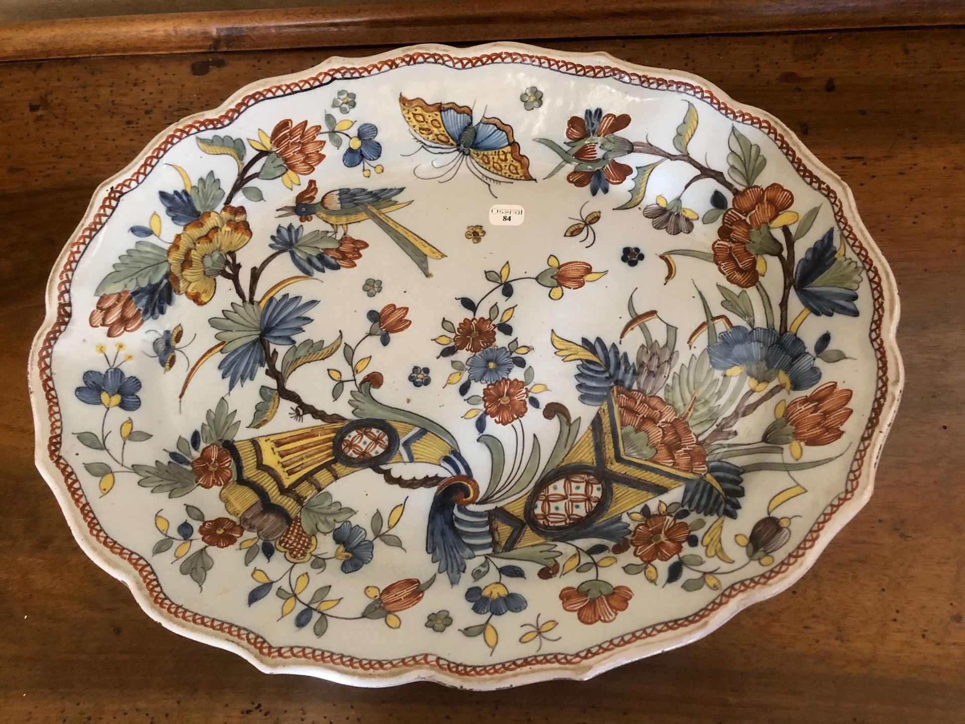 Null Large oval dish with scalloped edge in Rouen earthenware decorated with cor&hellip;