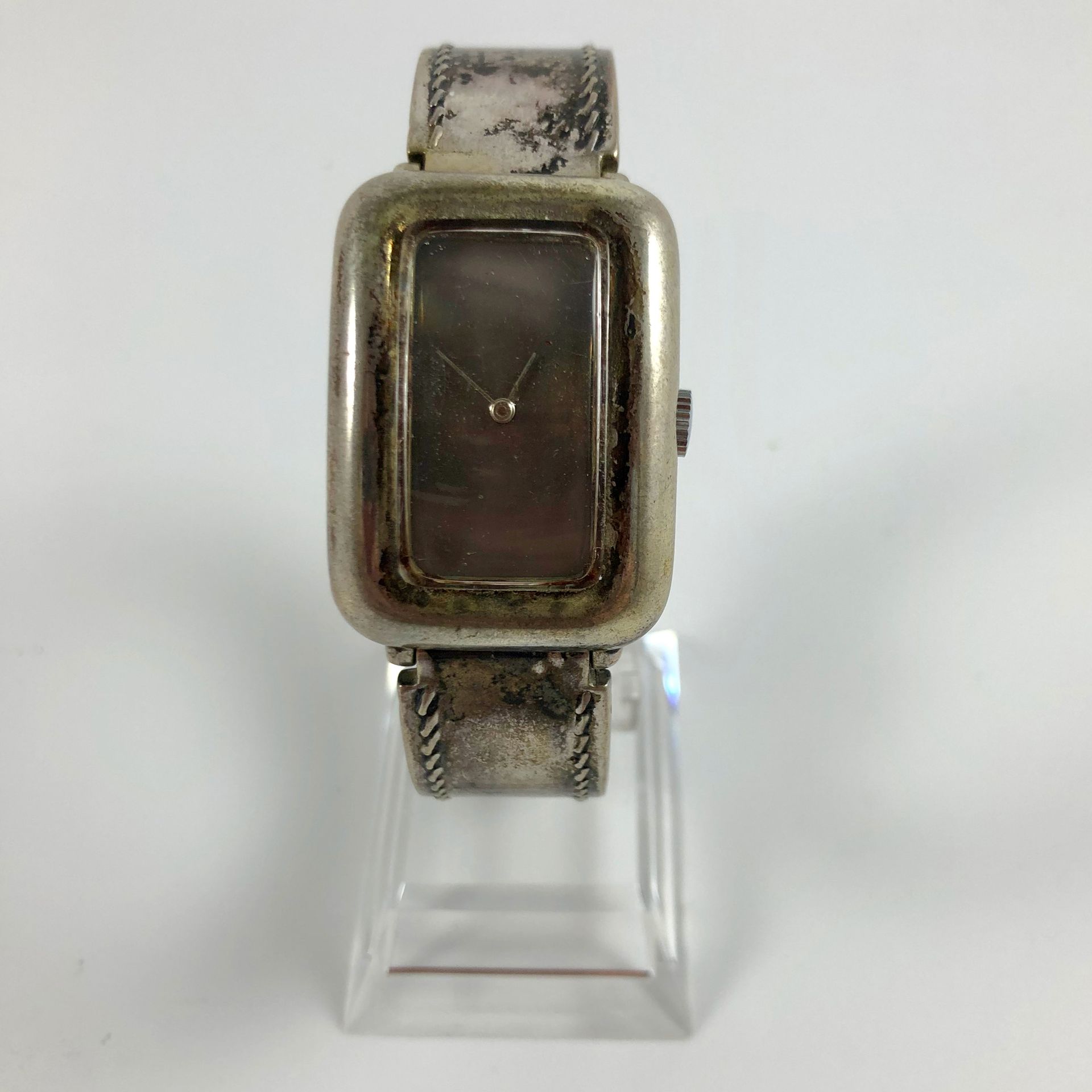 Null 
OREY PARIS. Rectangular watch in silver. Curvex case. Smooth petrol dial w&hellip;