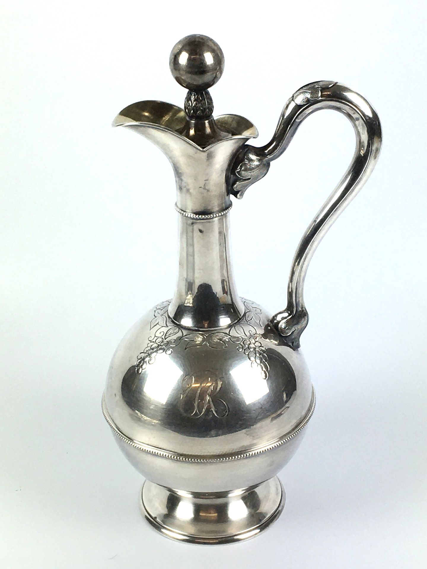 Null Large silver WINE JUG chased on the body of grapes and initials. Marked 813&hellip;