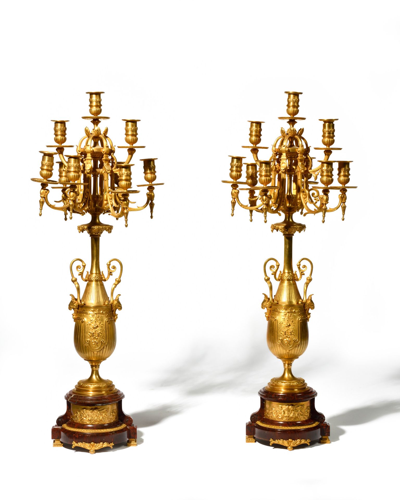 Null An important PAIR OF CANDELABRES in gilt bronze and red marble. The ormolu &hellip;