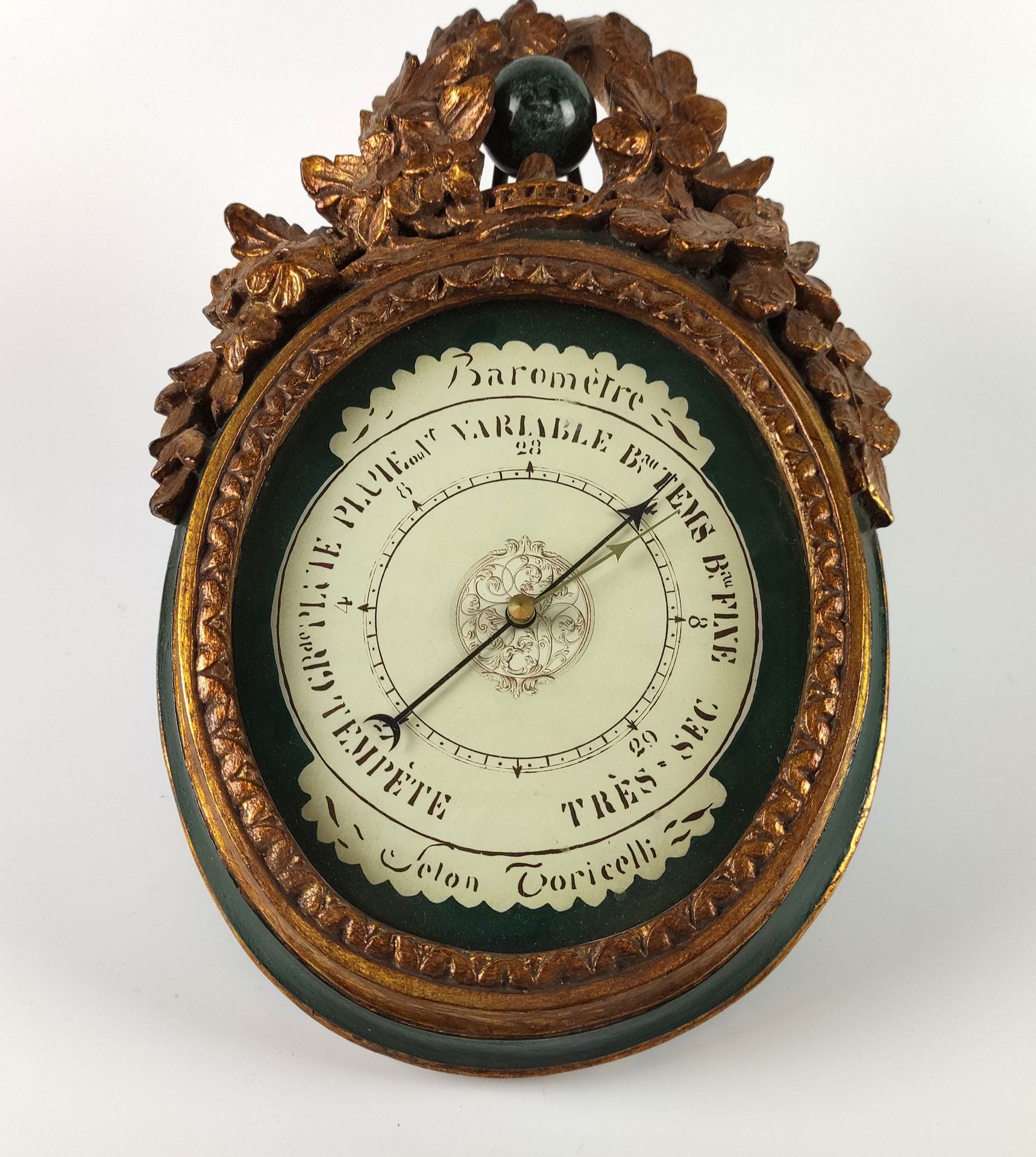 Null BAROMETER in green lacquered wood and gilded with carved flowers on the ped&hellip;