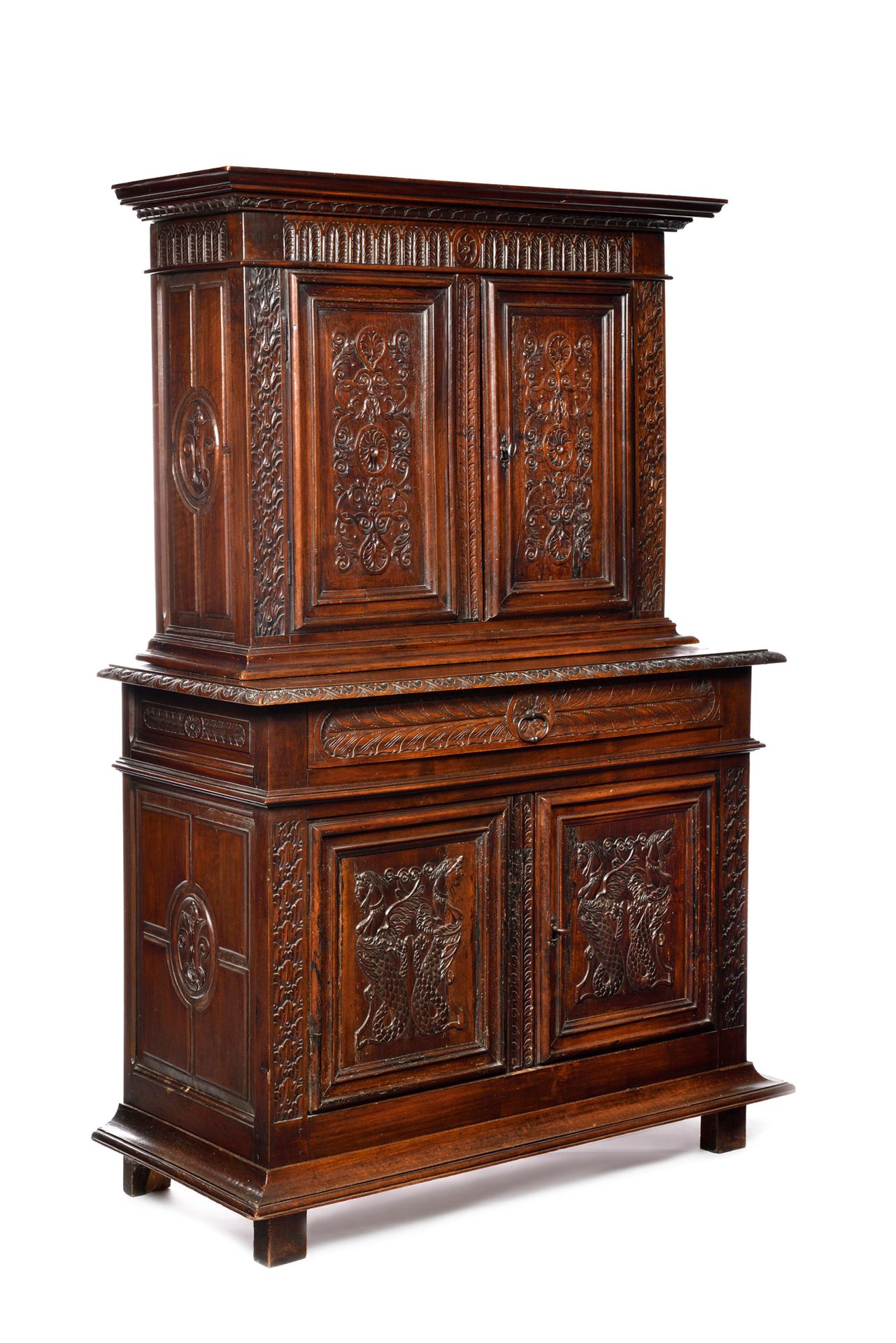 Null A carved walnut two-body chest of drawers with four doors decorated with fo&hellip;