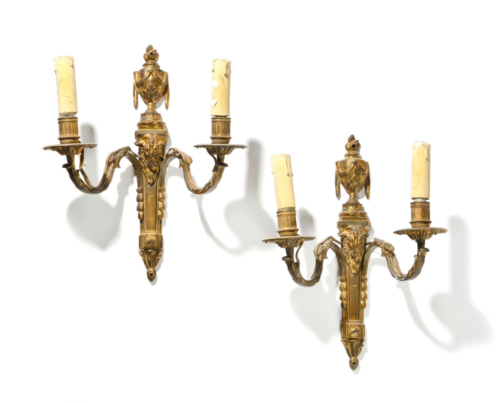 Null A PAIR OF GOLDEN BRONZE LIGHTS with two arms of light decorated with rams' &hellip;