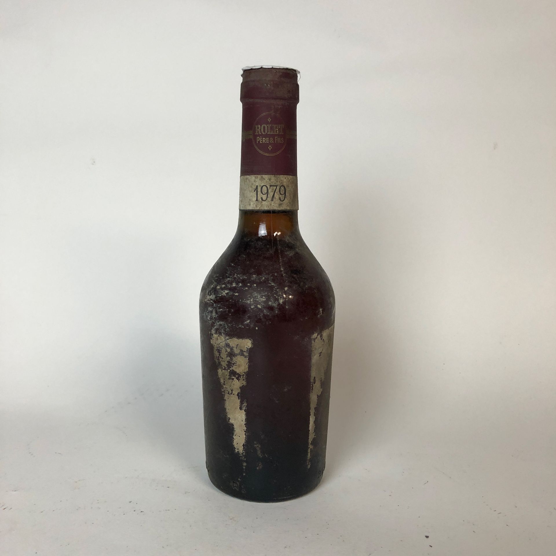 Null 1 botella JURA 1979 Rolet Père et fils (etiqueta destruida)