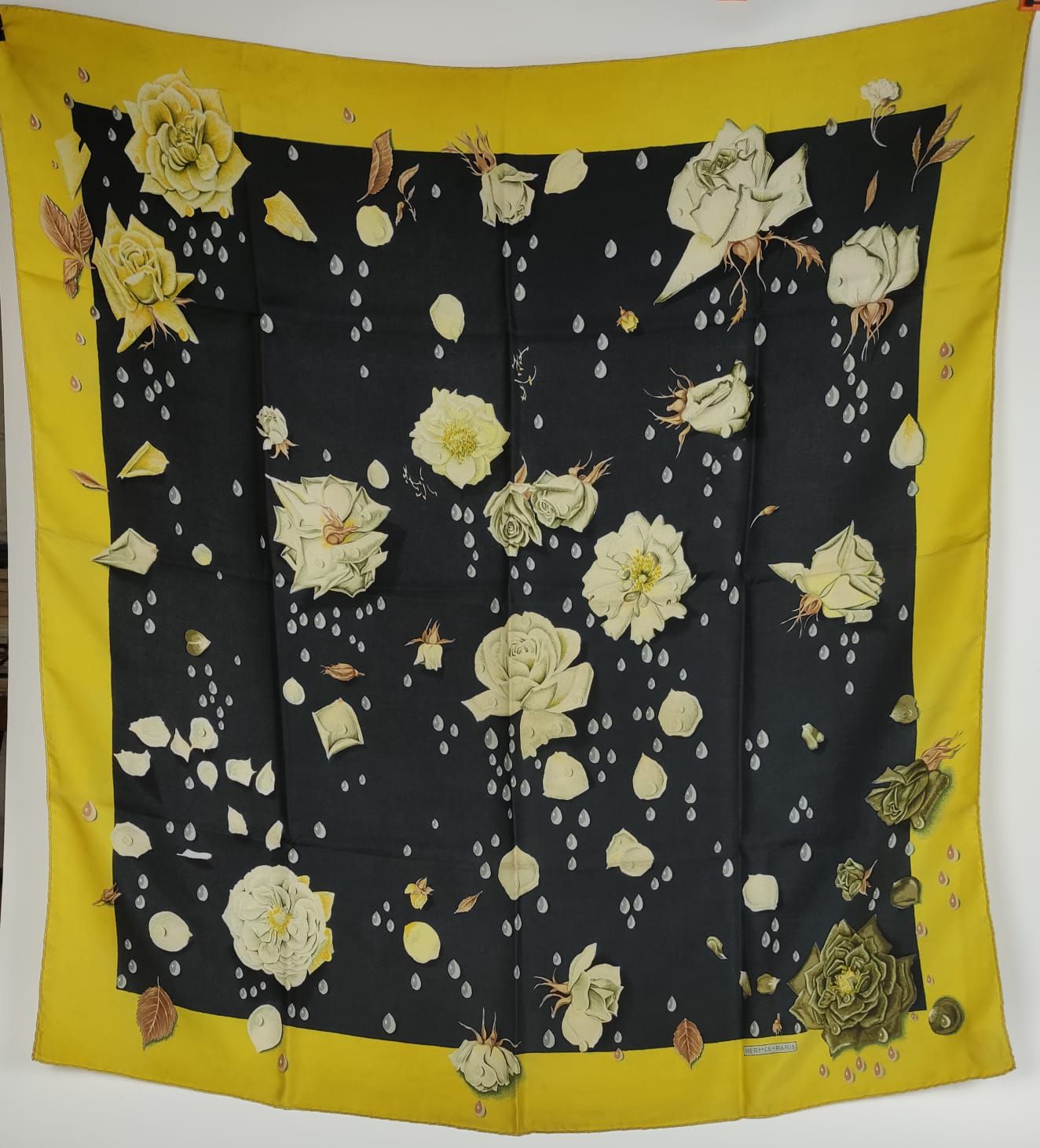 Null HERMES Silk scarf decorated with rosebuds on a black background. Stains