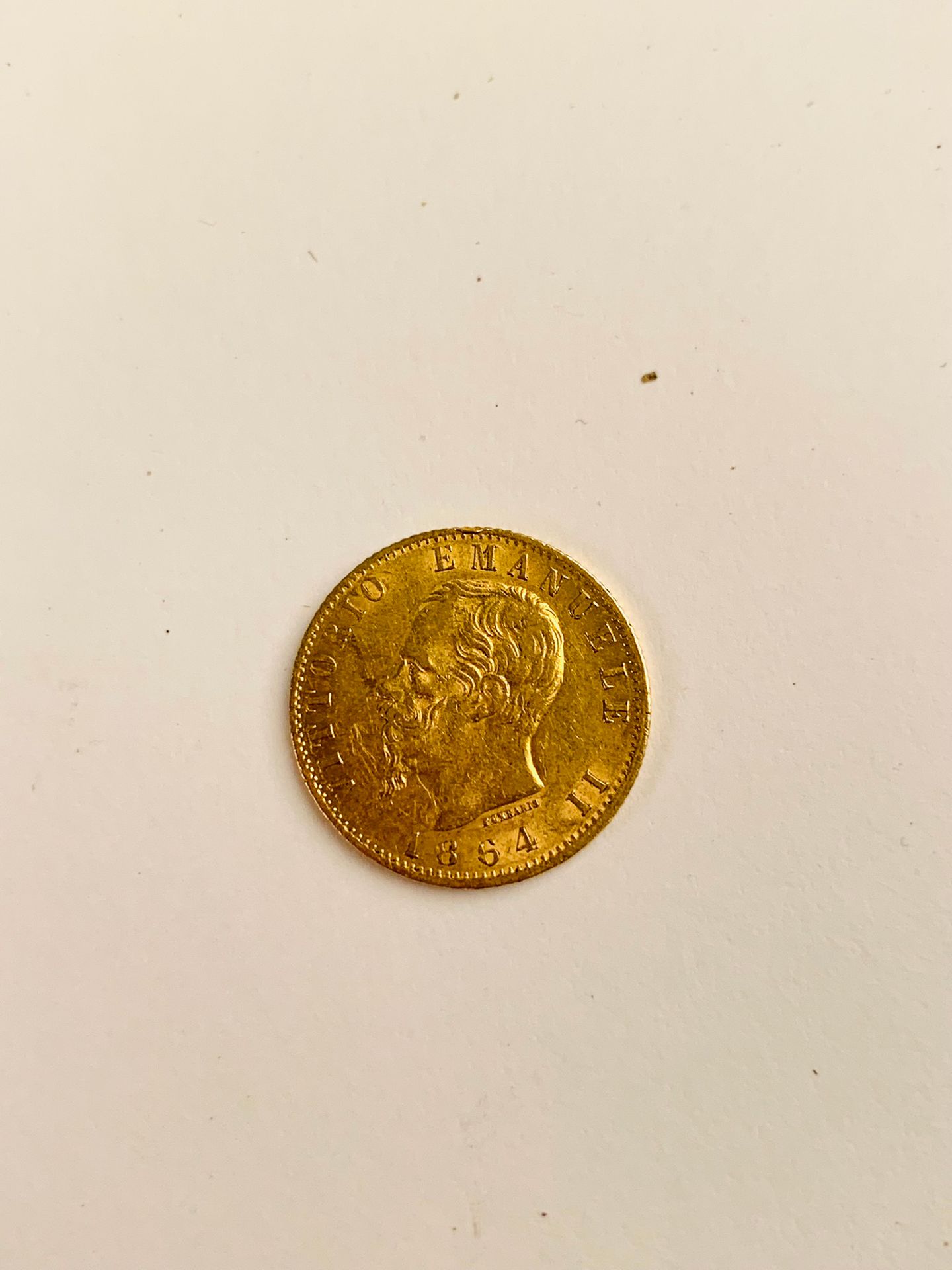 Null 1块20里拉的黄金1864年，伊曼纽尔二世。重量：6.43克
