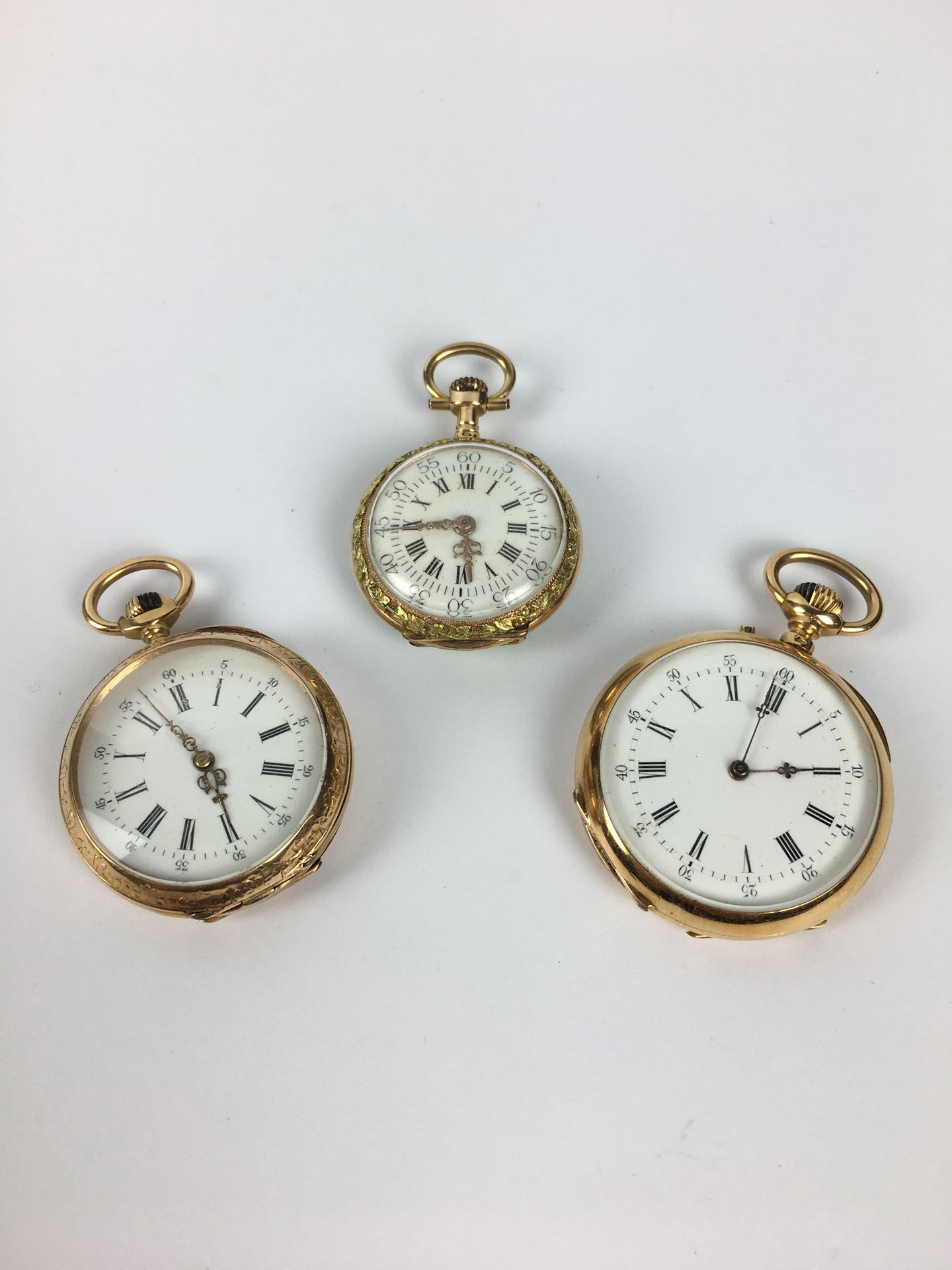 Null THREE GOSPEL WATCHES in yellow gold Total gross weight: 65 g Diameters: 20 &hellip;