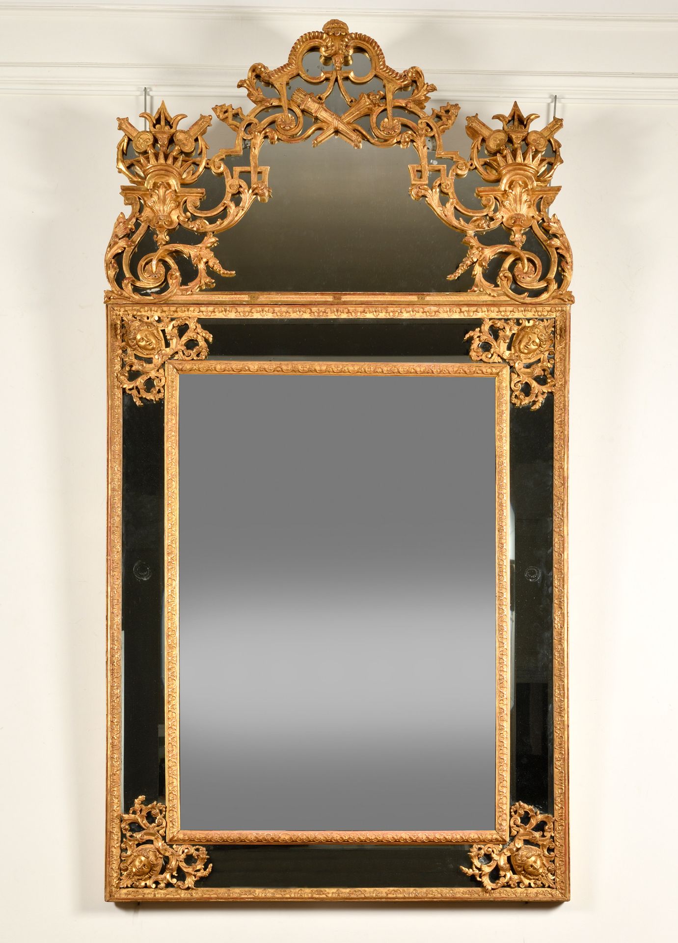 LARGE MIRROR with pediment and parecloses in gilded wood, molded and carved with&hellip;