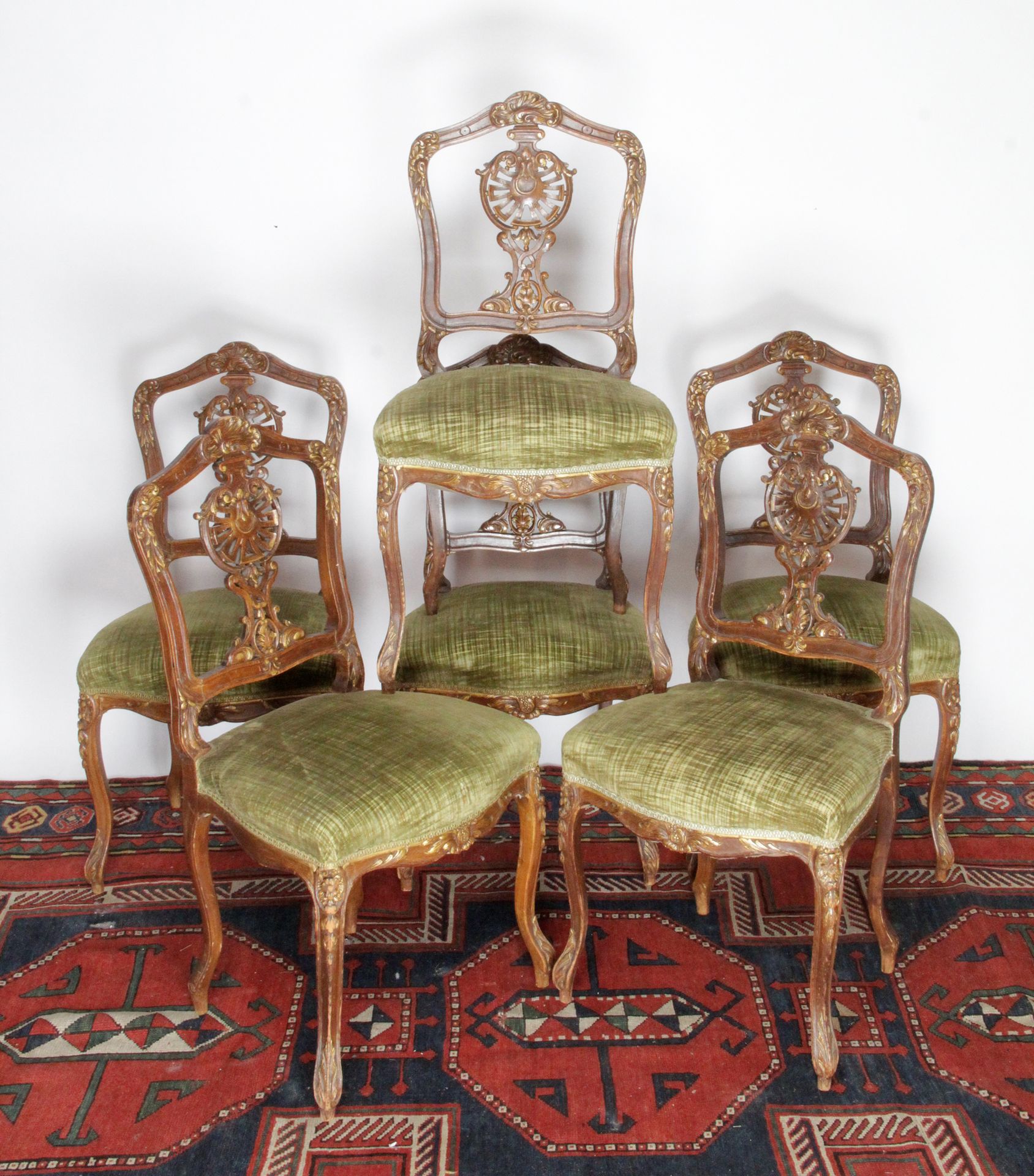 Null SET OF SIX CHAIRS in molded, carved and openwork natural wood and partially&hellip;