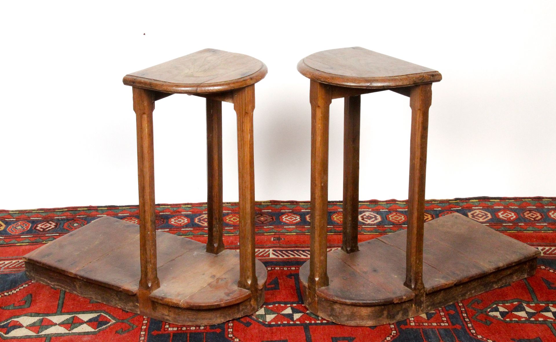 Null PAIR OF CHANTRE TABOURETS, in molded oak, upright with cut sides, resting o&hellip;