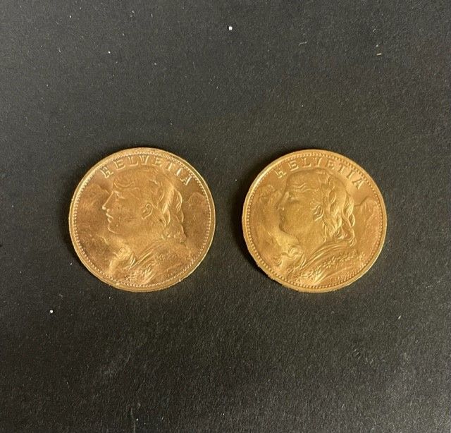 Null 
瑞士

两枚20法郎的瑞士金币Vrenelli 1947。黄金900/1000

重量：12.9克