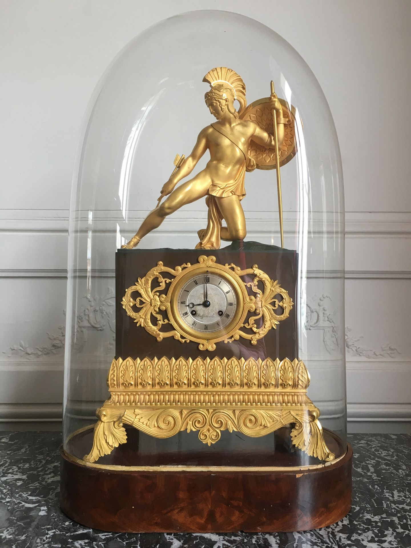 Null Gilt bronze and sheet metal clock decorated with Achilles. Dial signed Malf&hellip;