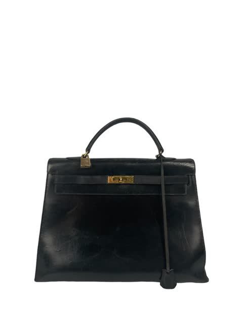 Null HERMES PARIS Handtasche Modell Kelly 36 cm aus schwarzer Box mit goldenen B&hellip;
