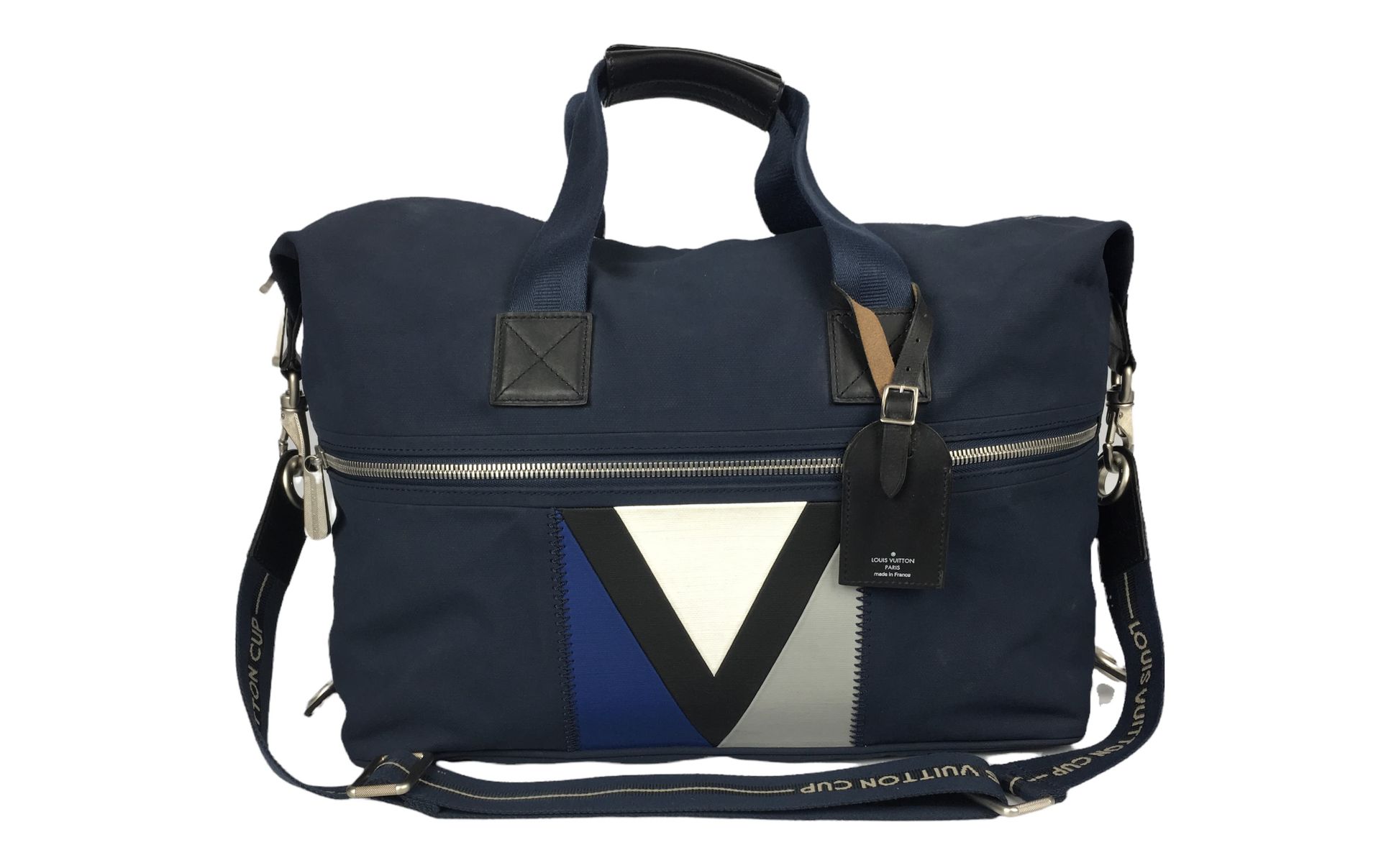 Null 路易威登（LOUIS VUITTON）蓝色帆布旅行袋，拉链封口，一个外袋，单肩带。60 x 30 x 30厘米（小的痕迹）。