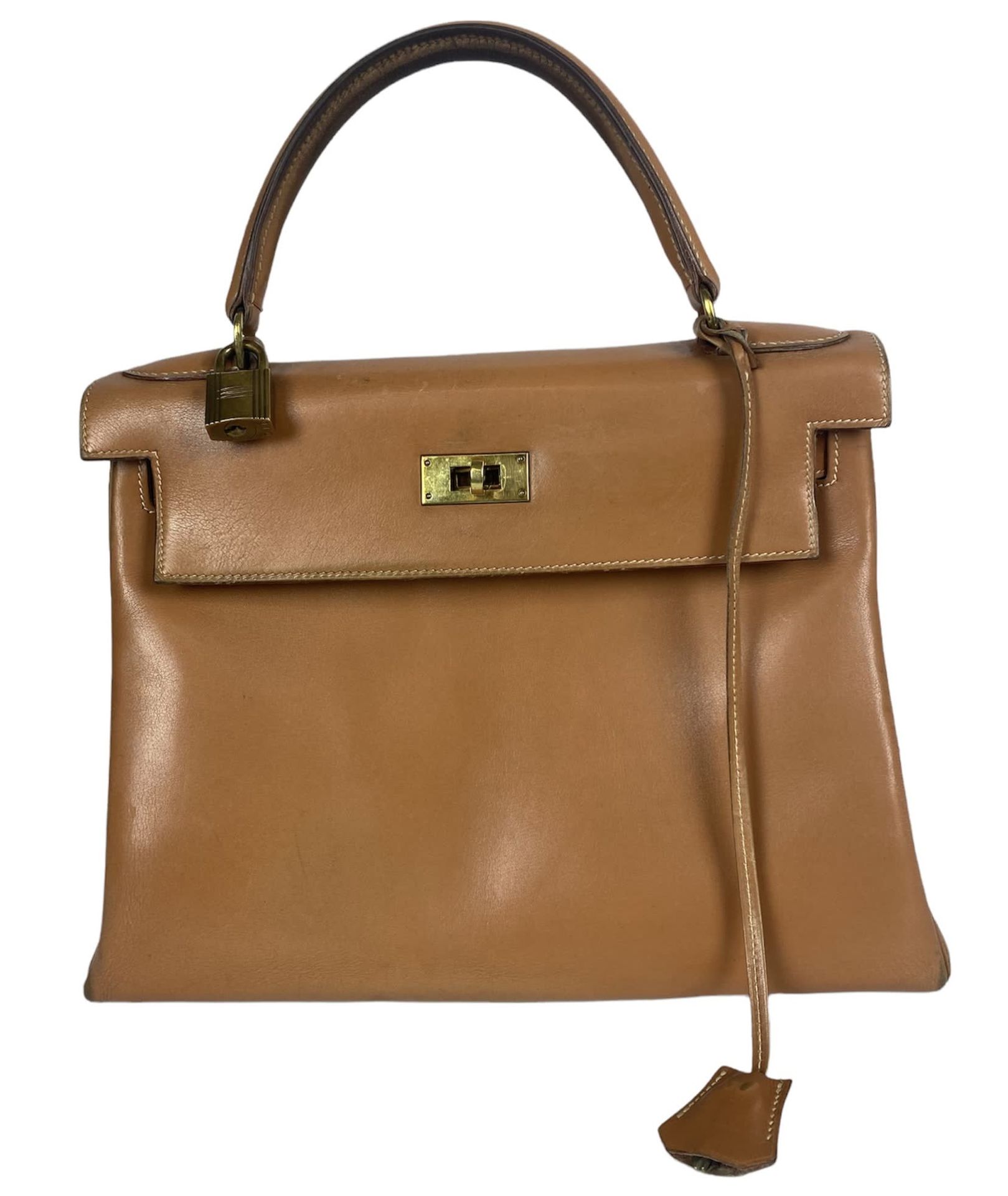 Null HERMES PARIS Kelly bag 28 cm in camel box with gold metal hardware. Wear to&hellip;