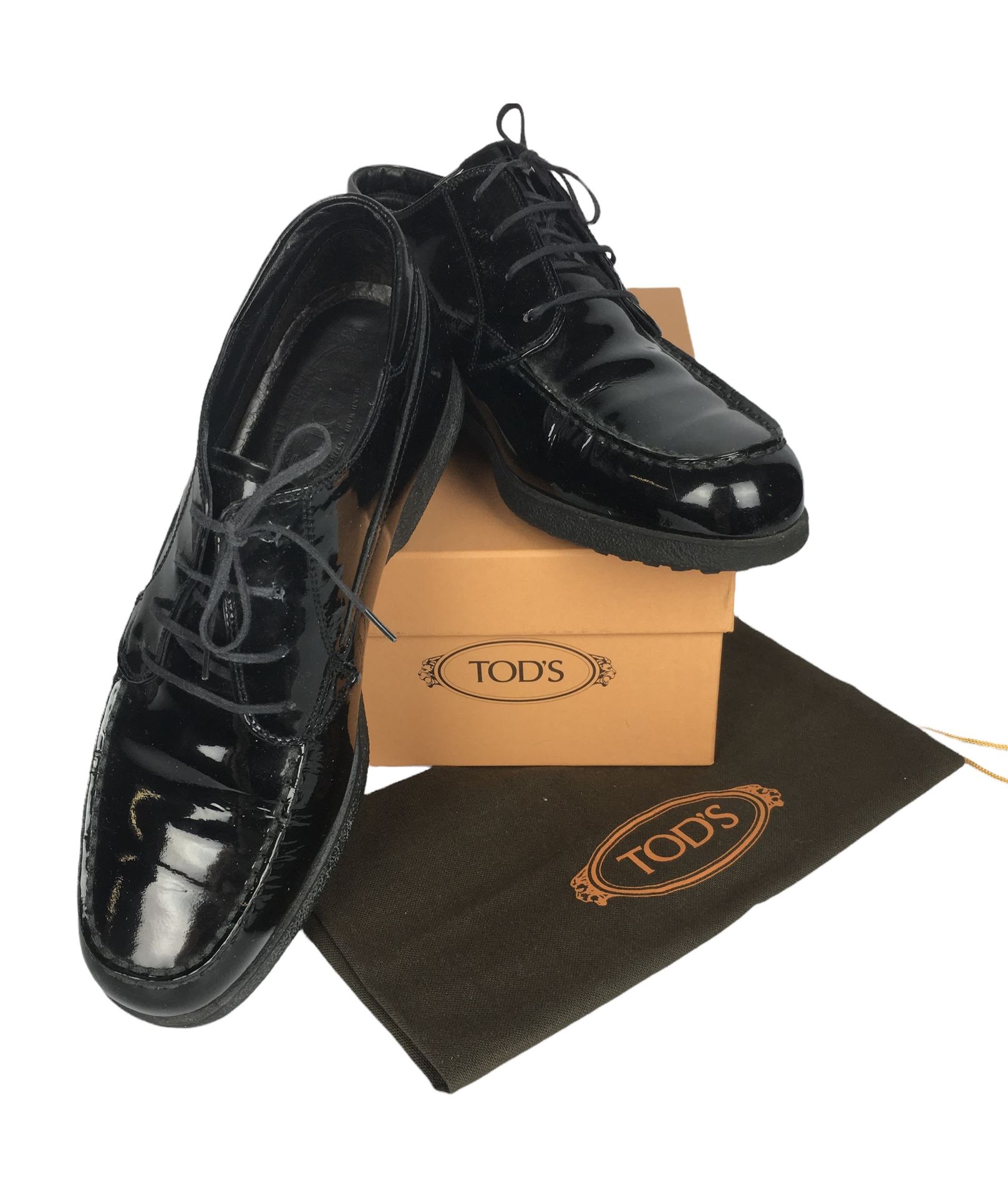 Null TOD'S Pair of lace-up shoes in black patent. Rubber sole with studs. Box. T&hellip;