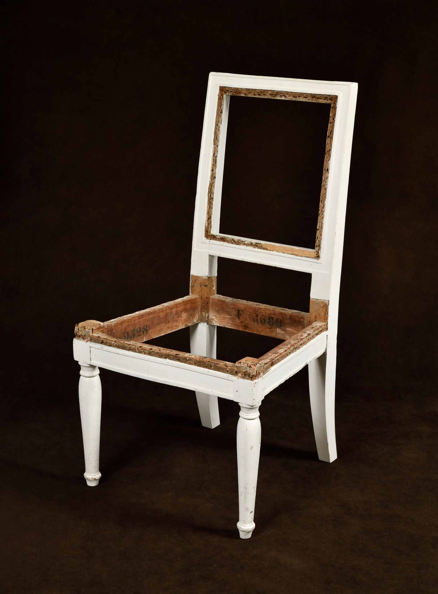 Null CHAIR

with flat rectangular back in molded and carved cream lacquered wood&hellip;