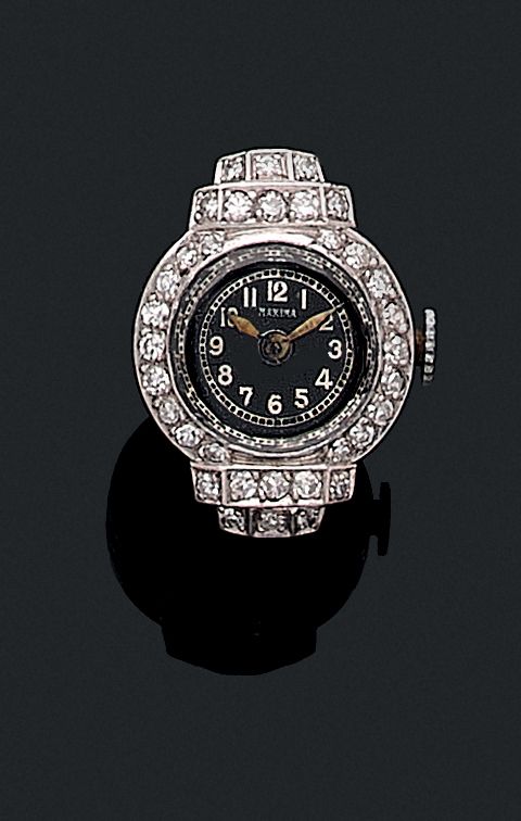 Null BAGUE 

retenant une montre au fond noir. Le cadran est entouré de diamants&hellip;