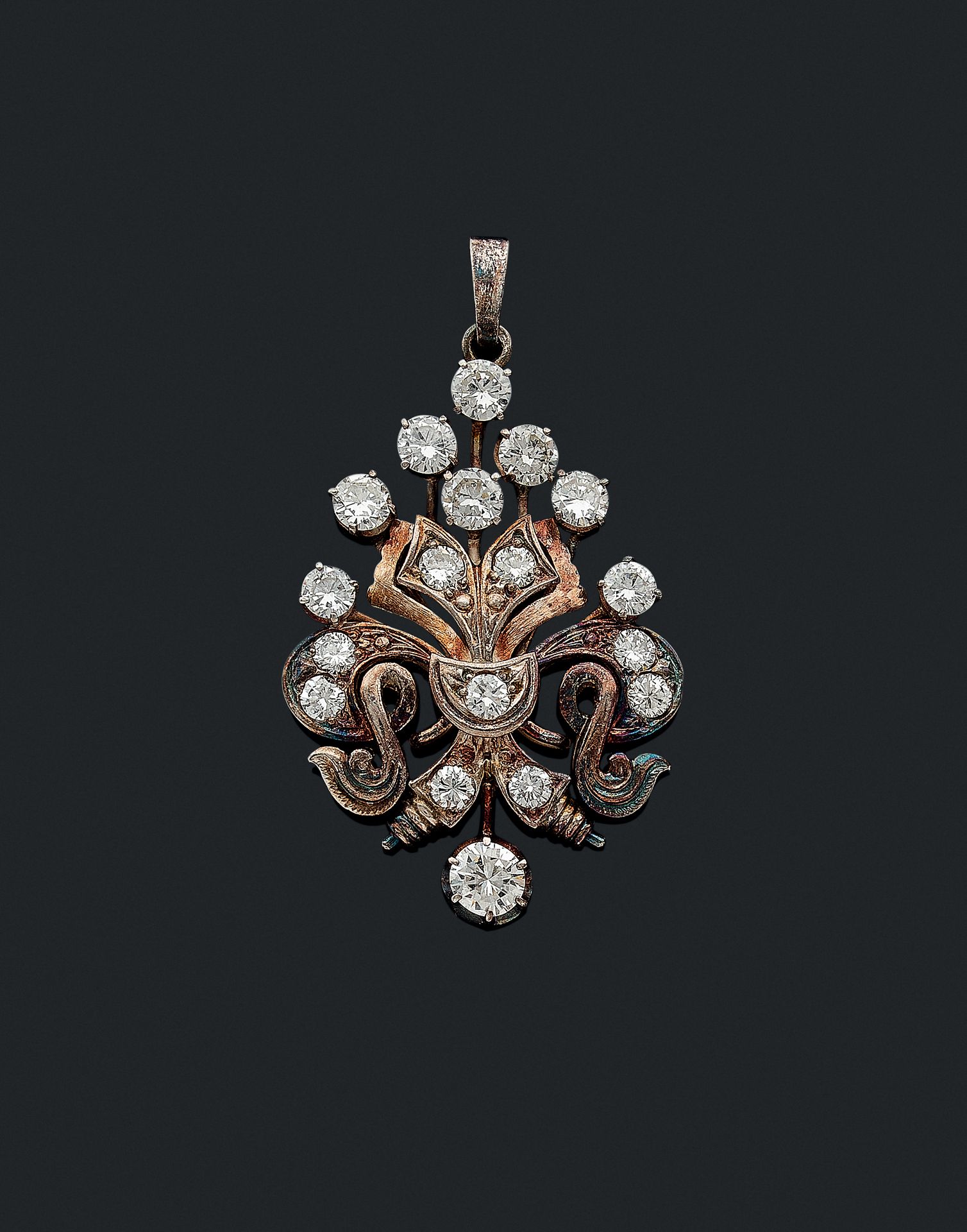 Null PENDANTS

holding a plant motif punctuated with brilliant-cut diamonds. Mou&hellip;