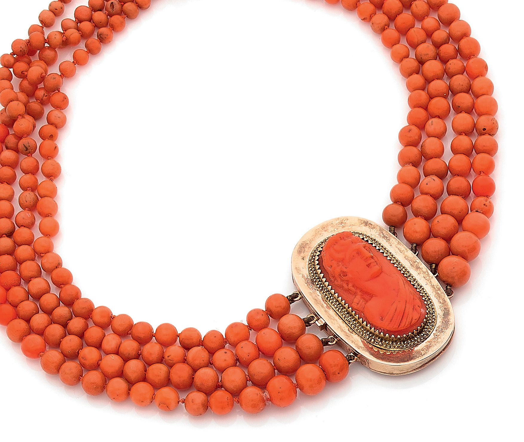 Null NECKLACE 

holding 4 rows of coral beads. The oval clasp holds the bust of &hellip;