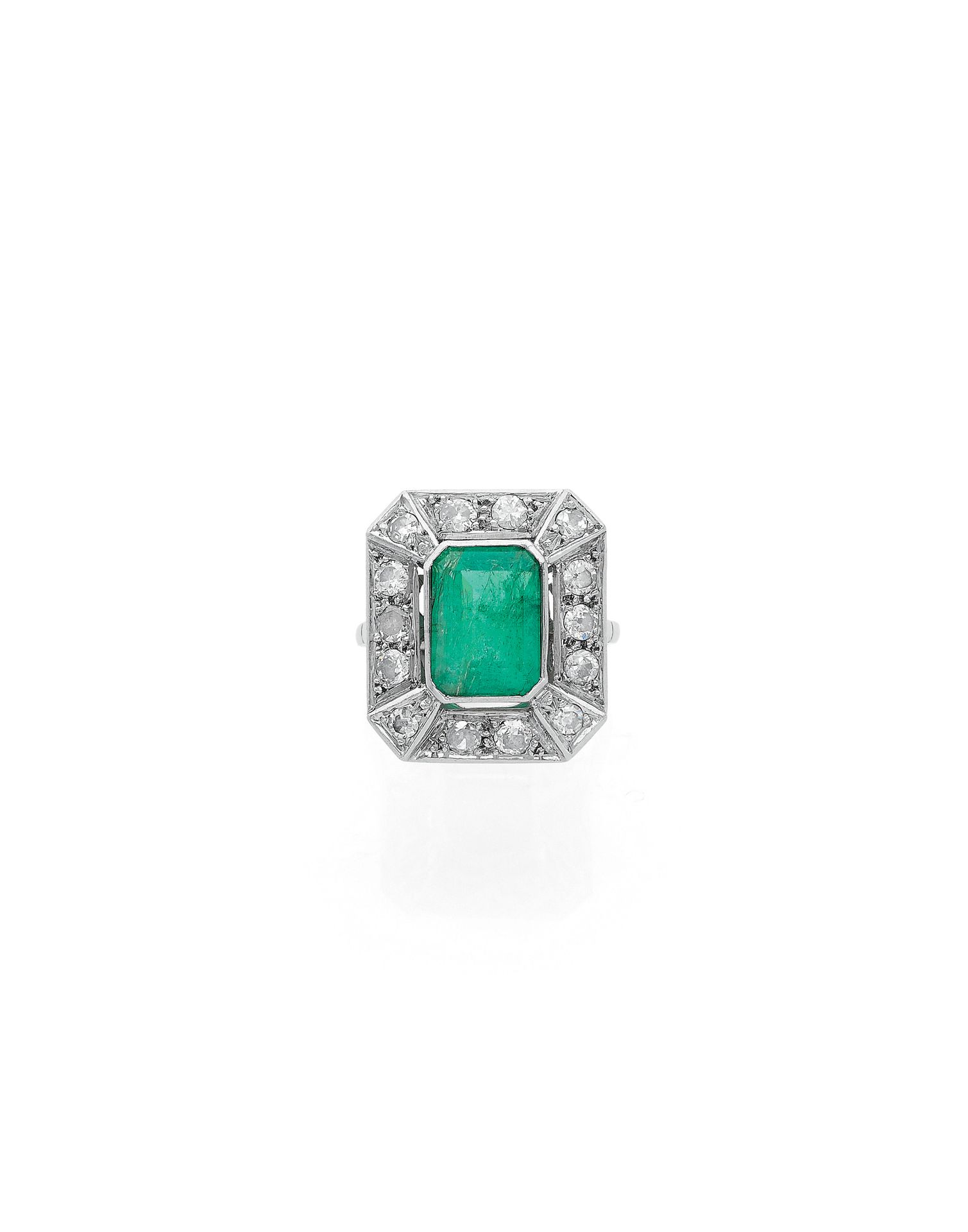 Null ART DÉCO

RING

holding a rectangular emerald with cut sides of 3 carats in&hellip;