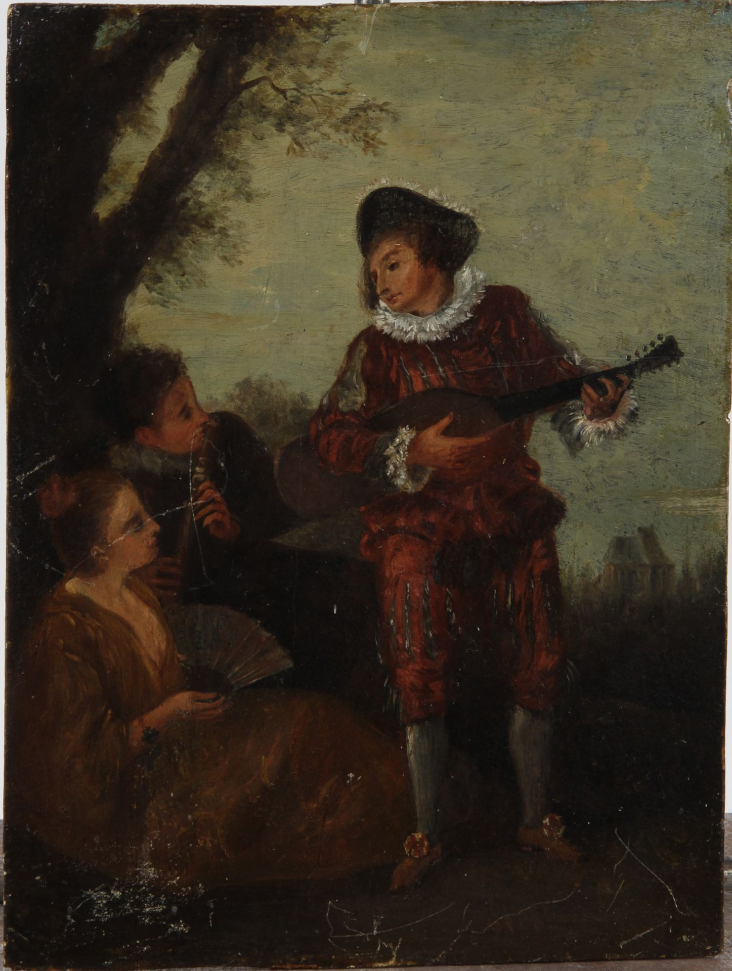 Null 华托的风格，"Le concert galant"，板上油画。

H.32 x W. 23.5 cm

(面板略有弯曲，有小的划痕)