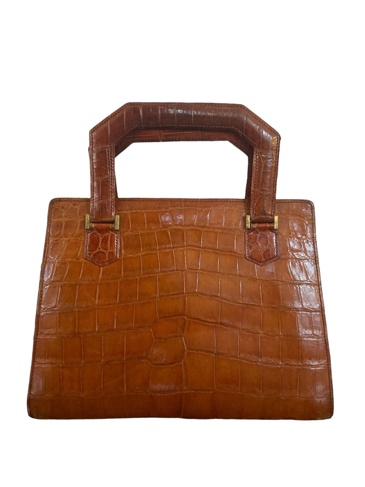 Null HERMES
Havana crocodile handbag opening with two gussets, a pocket and a ce&hellip;