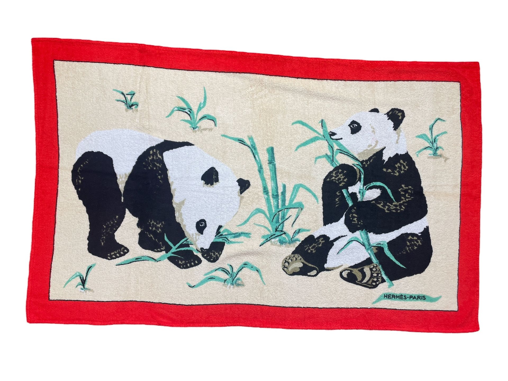Null HERMES
Drap de plage à décor de deux pandas.