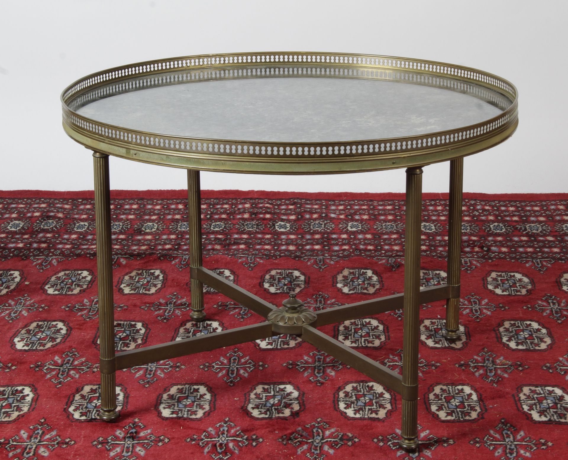 Null SMALL LOW TABLE of round shape in brass and bronze, marble top, openwork be&hellip;