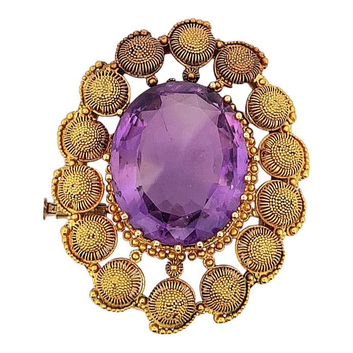 Null BROCHURE
holding an oval amethyst of about 11 carats in a circular design i&hellip;