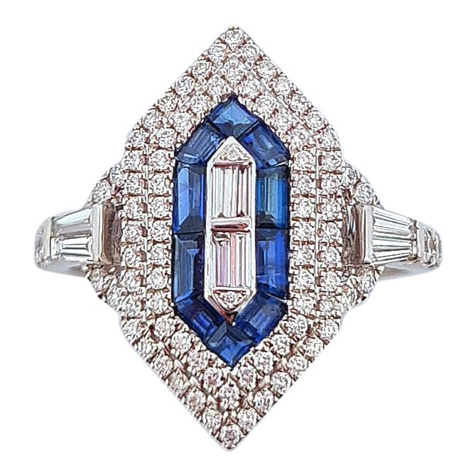 Null 戒指
持有一个几何设计，其中点缀着长方形切割的蓝宝石和钻石，锥形和圆形明亮式切割钻石。镶嵌在18K白金中。 
TDD : 54.
毛重：4.34克。 &hellip;