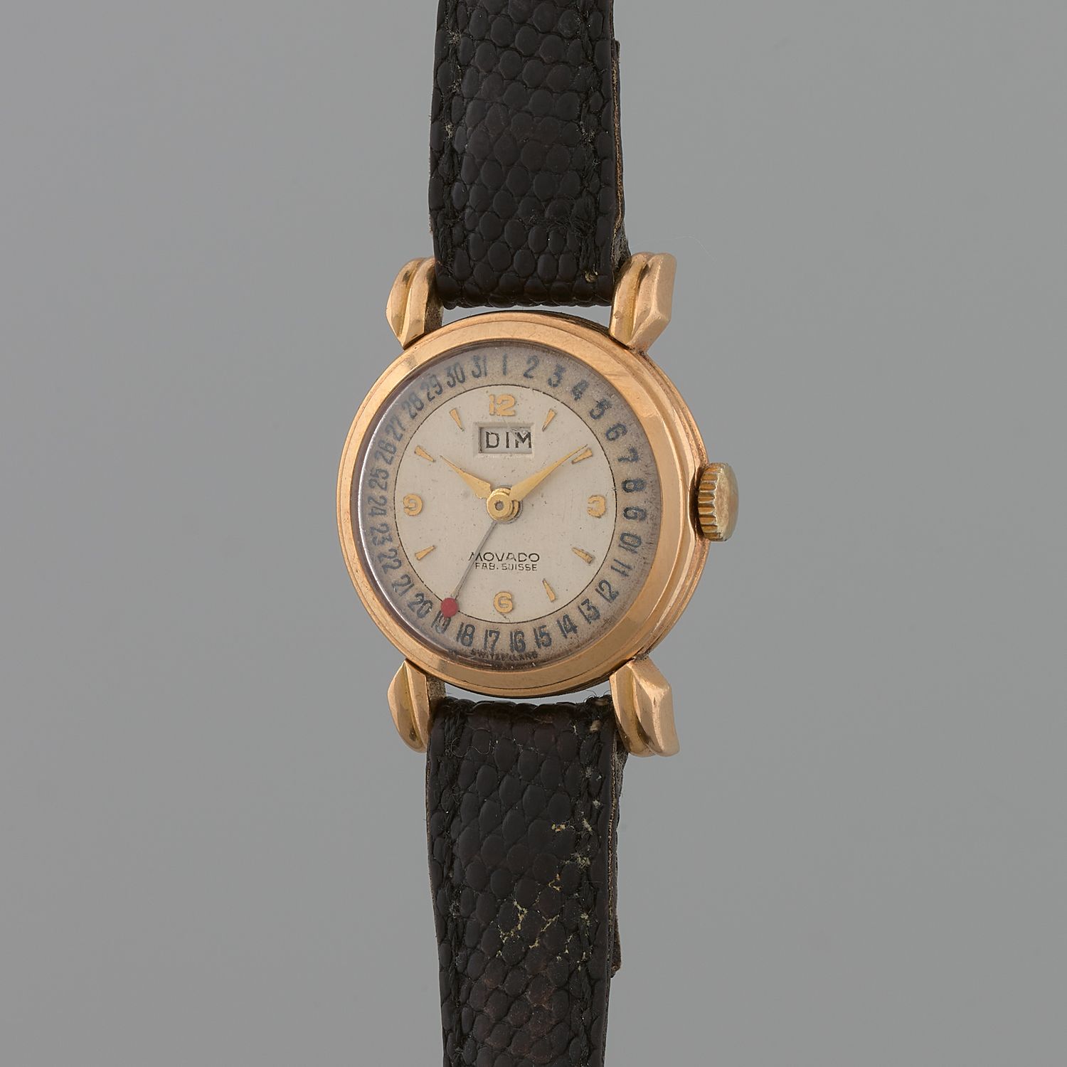 Null MOVADO 
Double-date.
Circa: 1950.
Lady's wrist watch Movado. Round case in &hellip;