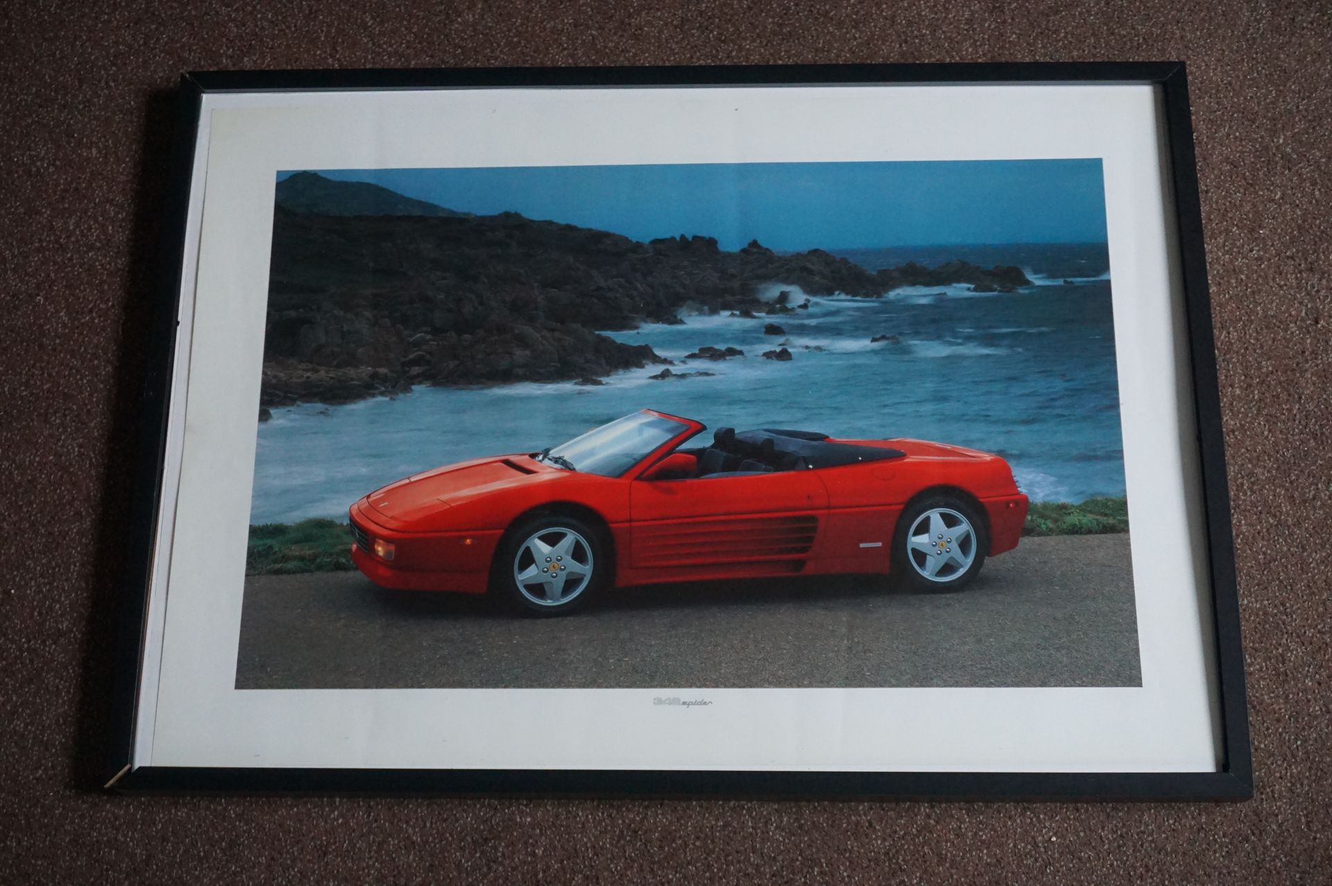 Null Ferrari 348 Spider in front of the sea
Framed under glass 
54 x 73 cm