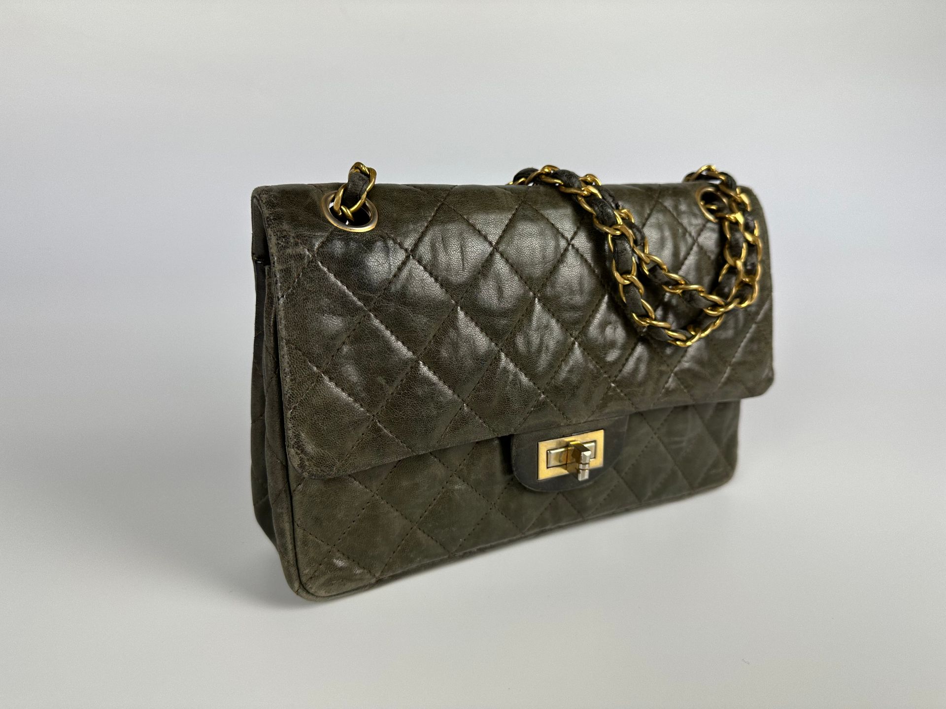 CHANEL 2.55 bag in green bronze quilted leather and leat…