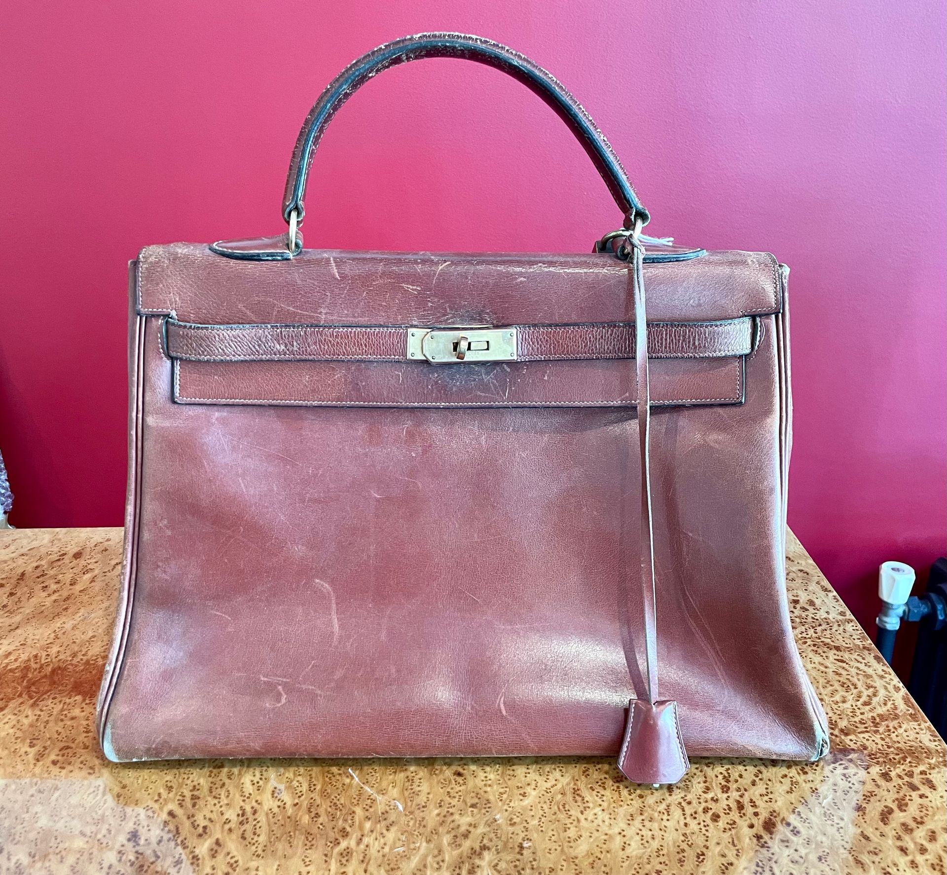 HERMES Paris Circa 1960 Brown leather Kelly bag. Used co…