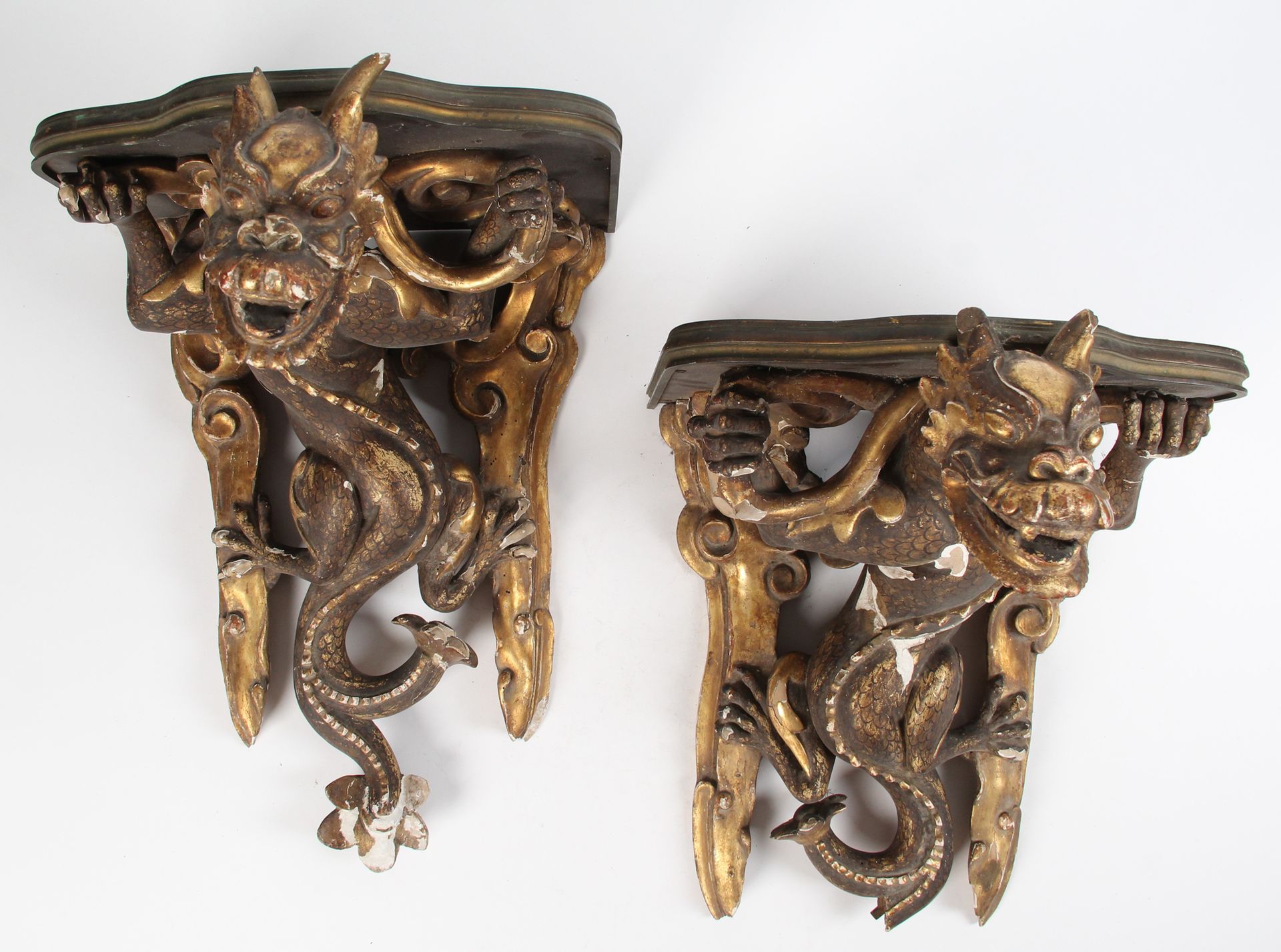 Null PAIR OF WALL BRACKETS

in carved, blackened and gilded wood, decorated with&hellip;