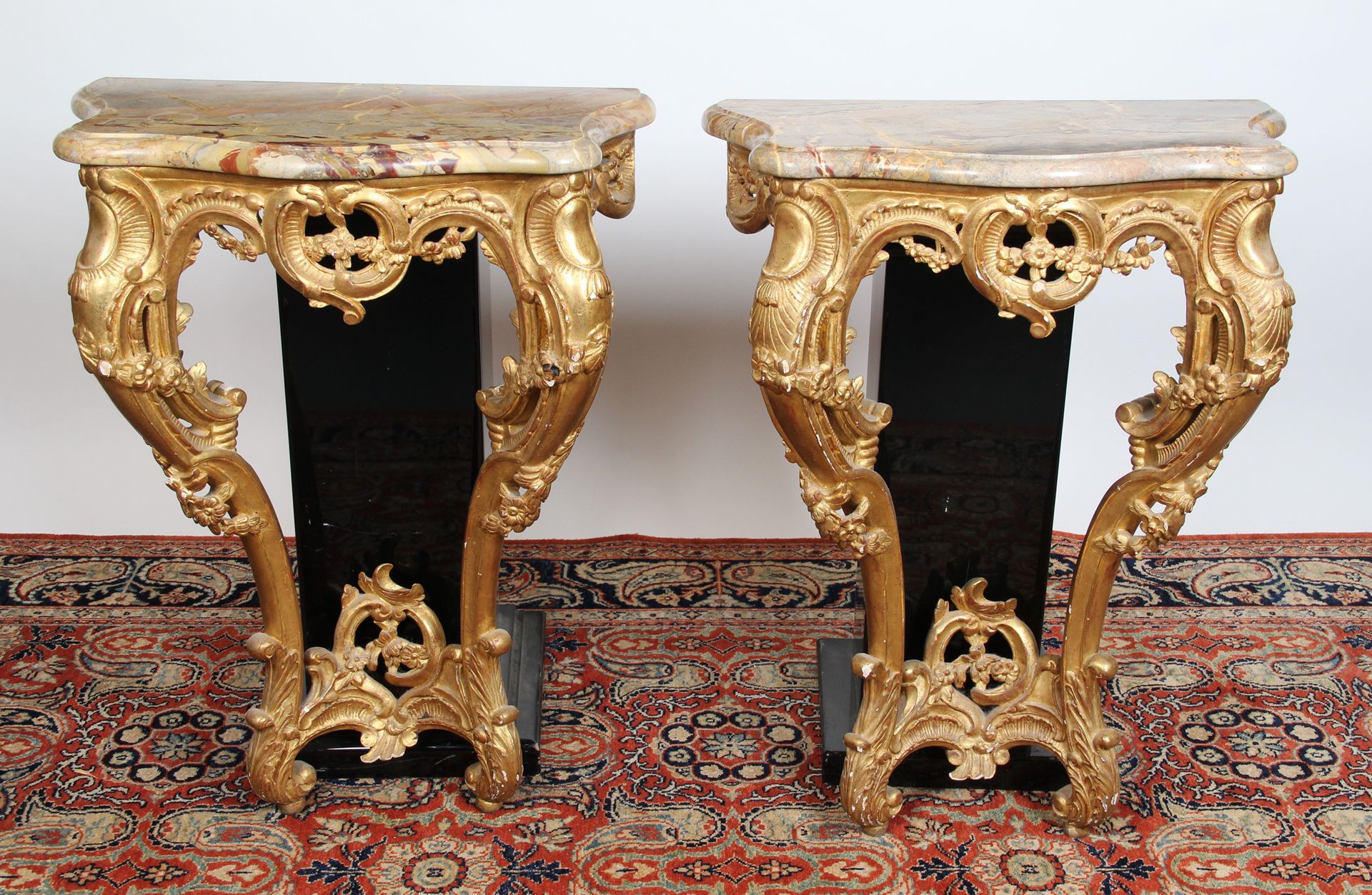 Null PAIR OF ENTRE-DEUX CONSOLES

in openwork wood, carved and gilded with rocai&hellip;