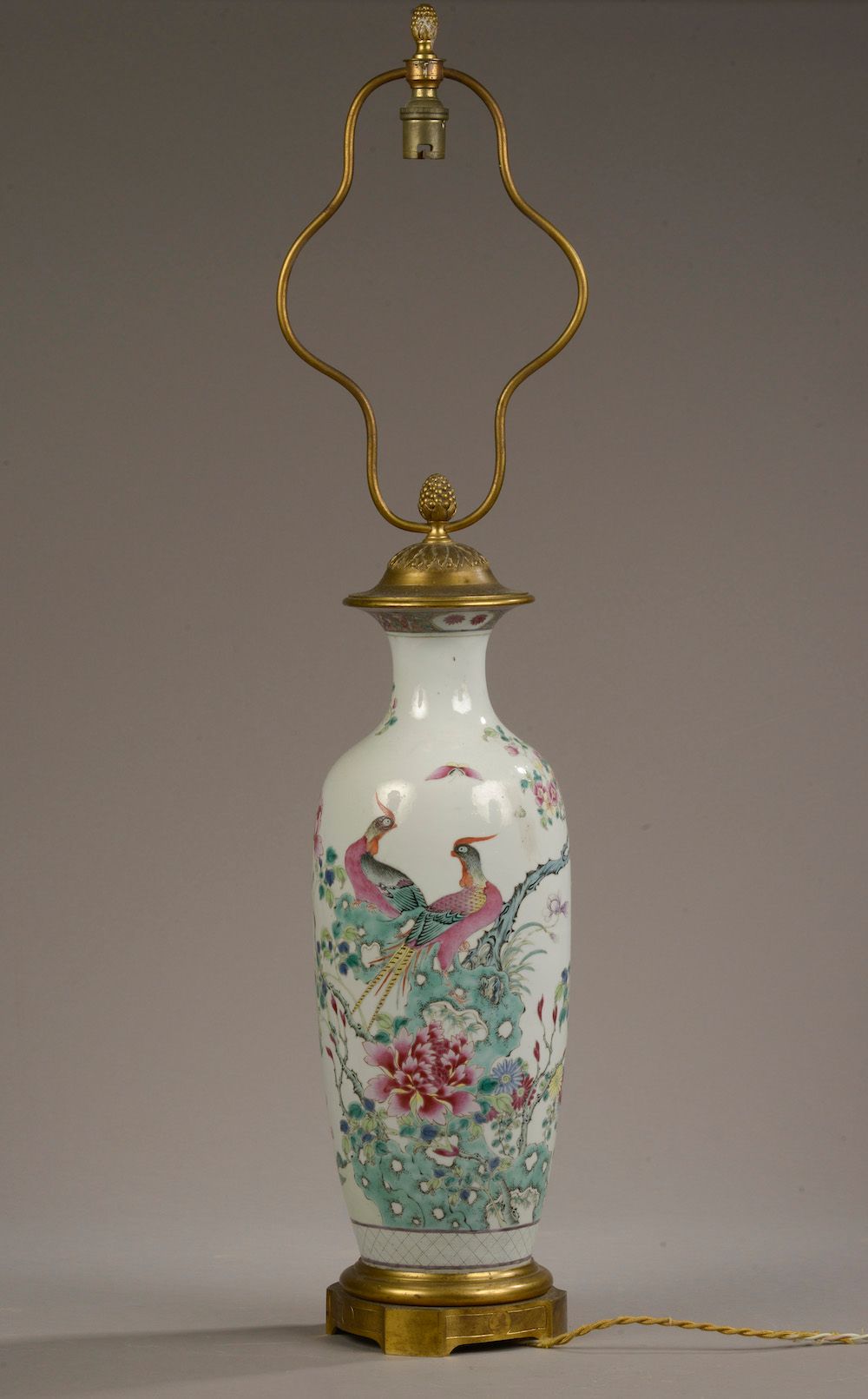 Null CHINA - 19th century.

A porcelain vase of baluster form with a flared neck&hellip;