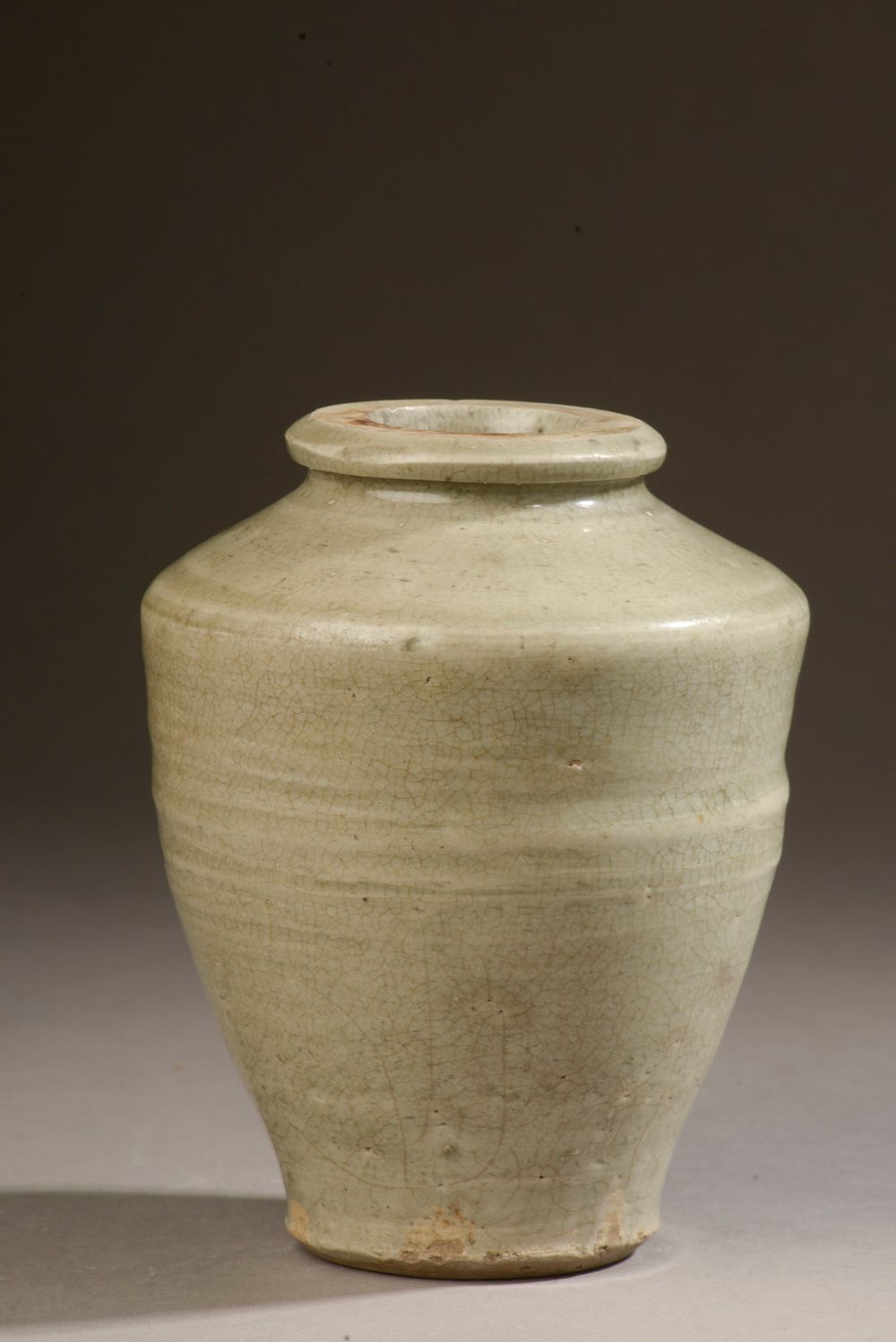 Null CHINA - YUAN period (1279 - 1368). 

 Celadon glazed stoneware baluster vas&hellip;