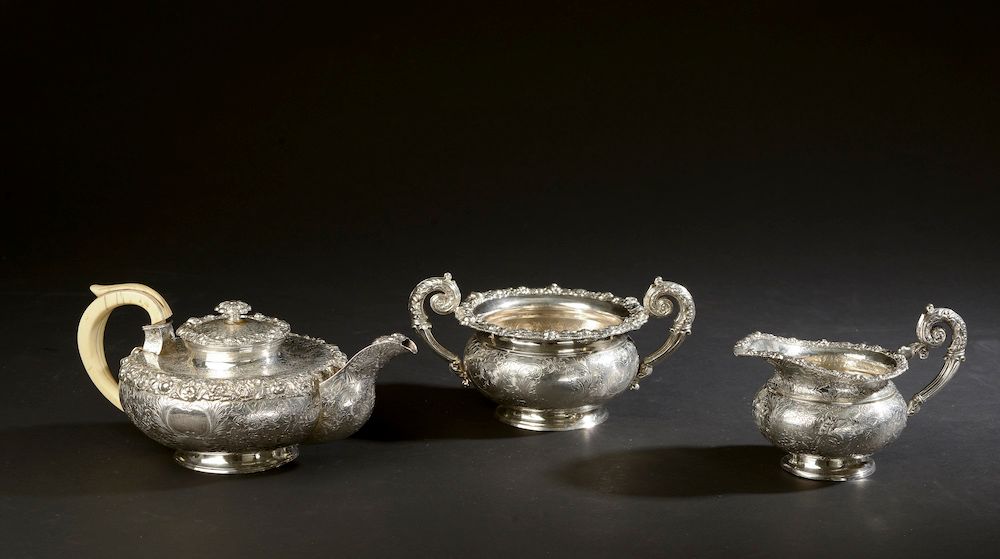 Null Important silver lot including :

- Silver tea service with rich floral dec&hellip;