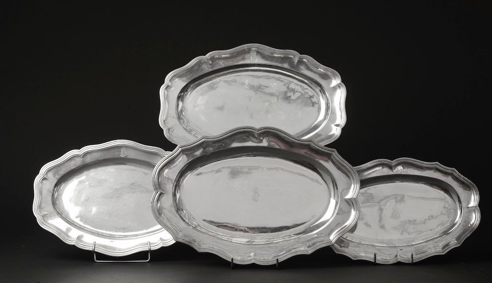 Null Four oval silver dishes with contoured edges, engraved later with the arms &hellip;