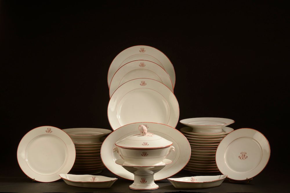 Null LE ROSEY, Paris.

Part of a white porcelain dinner service with red lines (&hellip;
