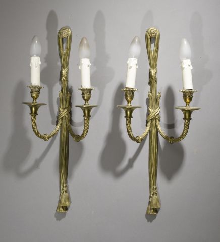 Null Pair of ormolu sconces with two twisted arms of light held by intertwined r&hellip;