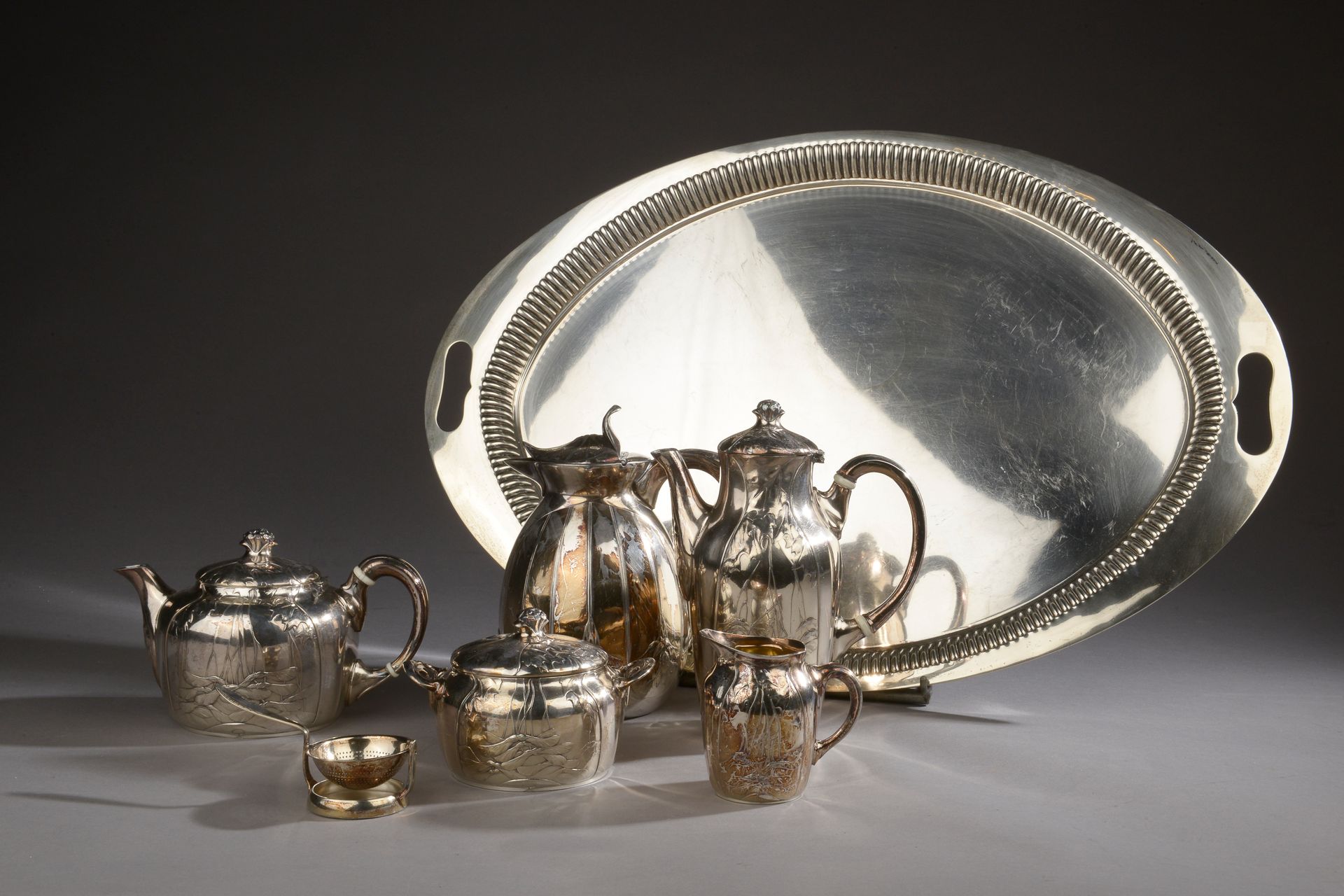 Null GALLIA for CHRISTOFLE.

Tea and coffee set with four silver plated pieces (&hellip;