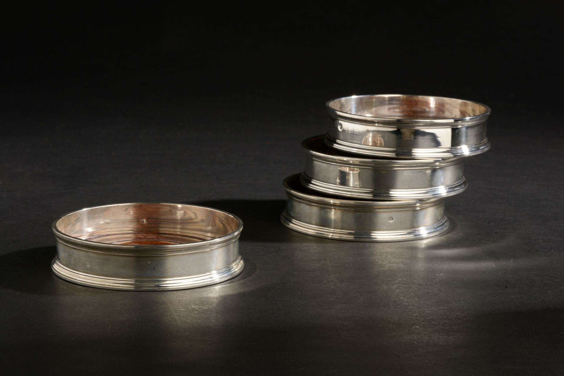 Null BANCELIN (XXth century).
Suite of four silver coasters 950 thousandth (Mine&hellip;