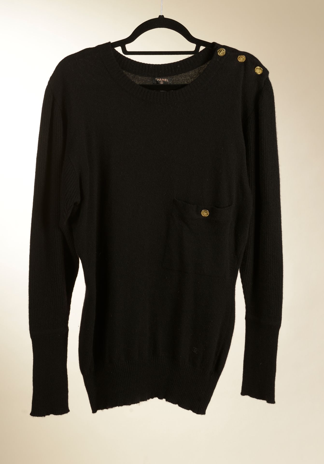 CHANEL. Black Scottish cashmere sweater, round collar, …